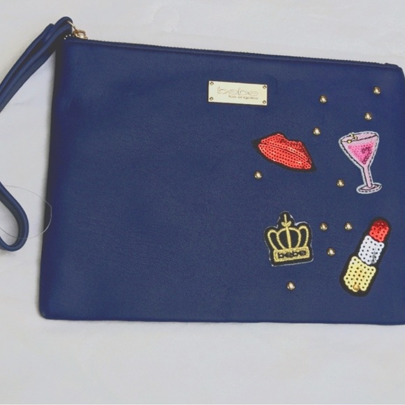 bebe Handbags - Bebe pouch purse wristlet